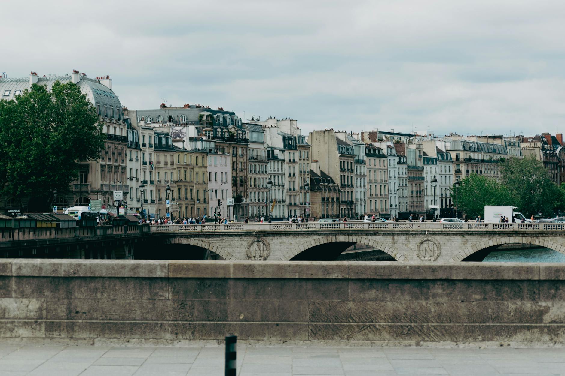 Parisian buildings along the Seine river showcasing historic architecture