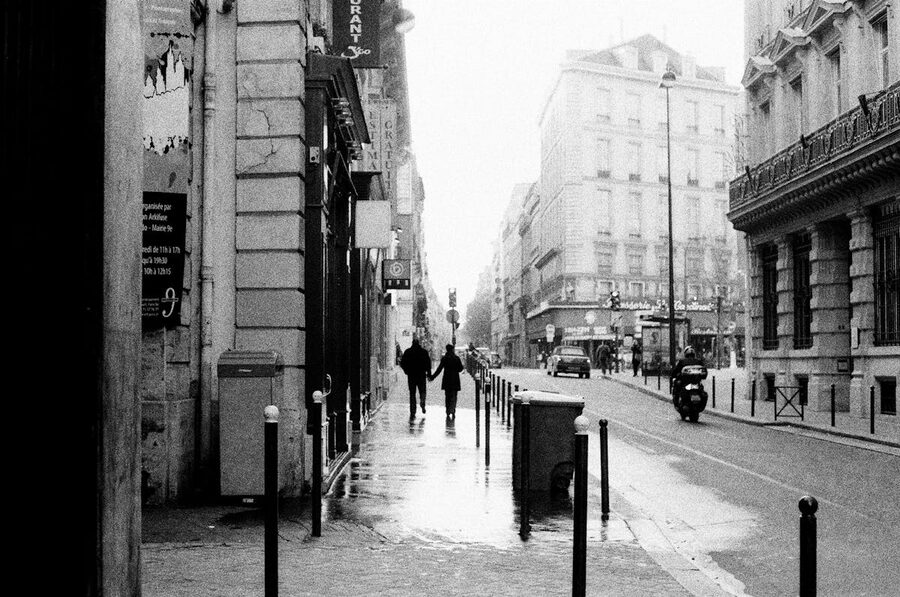 People walking on a classic Parisian street