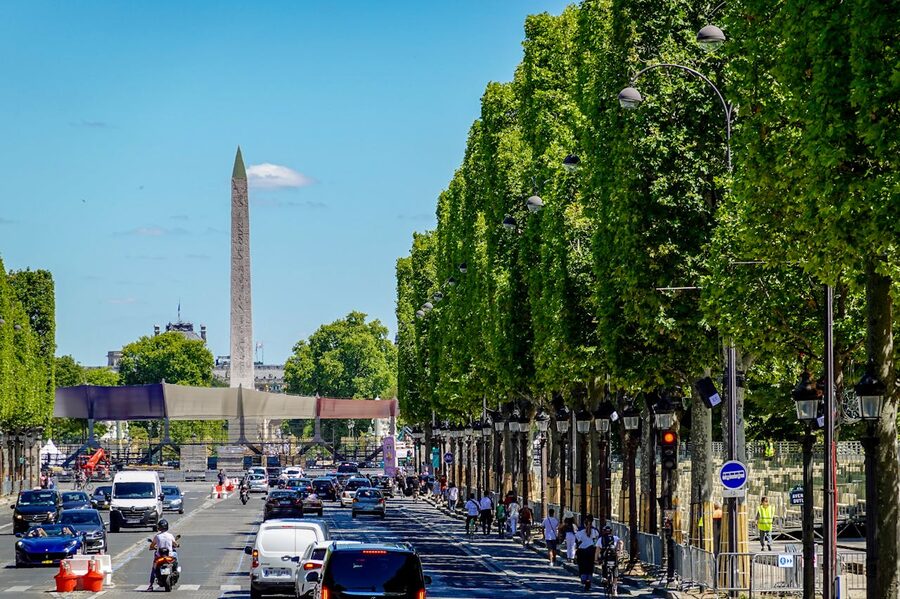 Paris street with Obelisk at Place de la Concorde