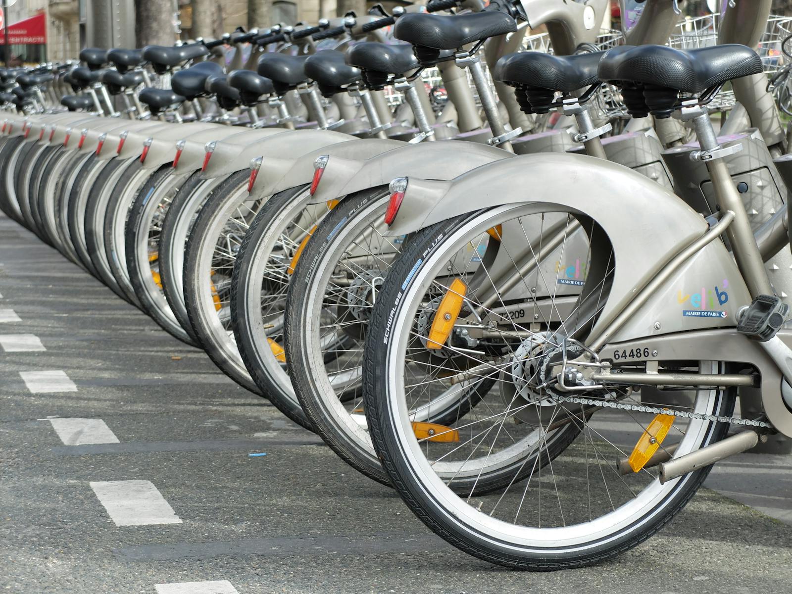 A row of Velib bicycles parked in Paris highlighting the city's urban cycling culture