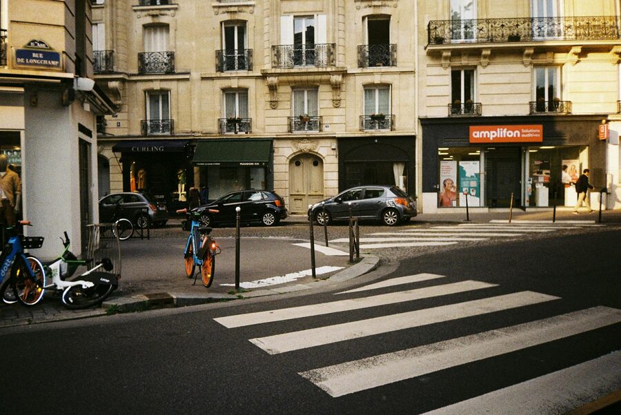 Parisian street corner with bicycles and classic cafe