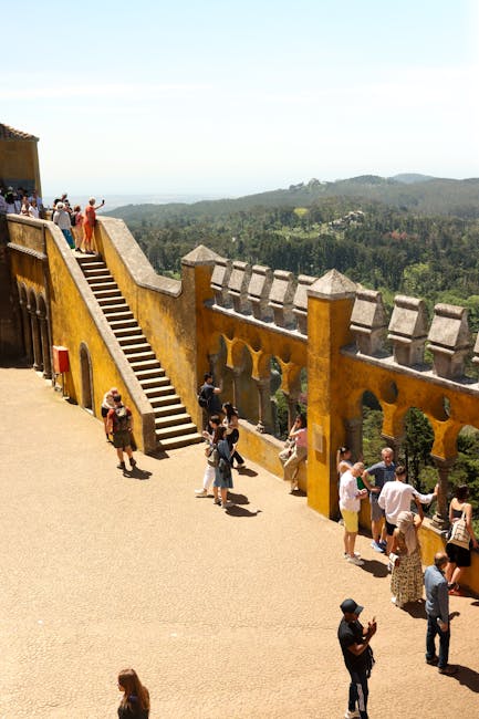Detailed red and yellow walls of Pena Palace with decorative elements