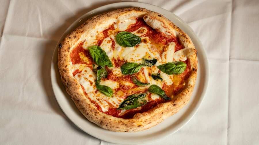 Classic Neapolitan Margherita pizza with fresh basil