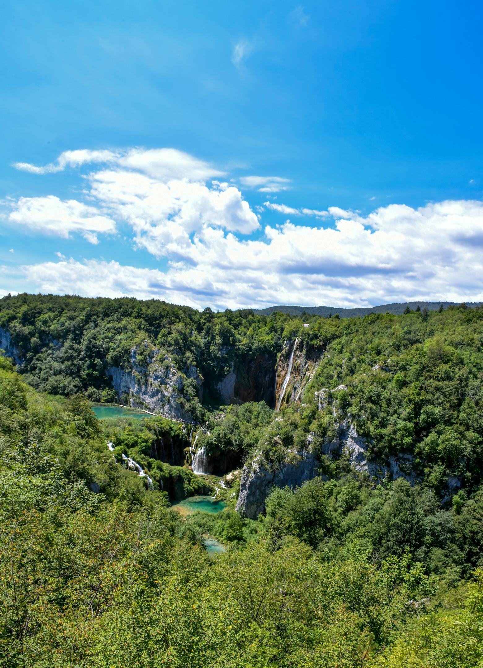 Aerial view of lush greenery and waterfalls at Plitvice Lakes National Park