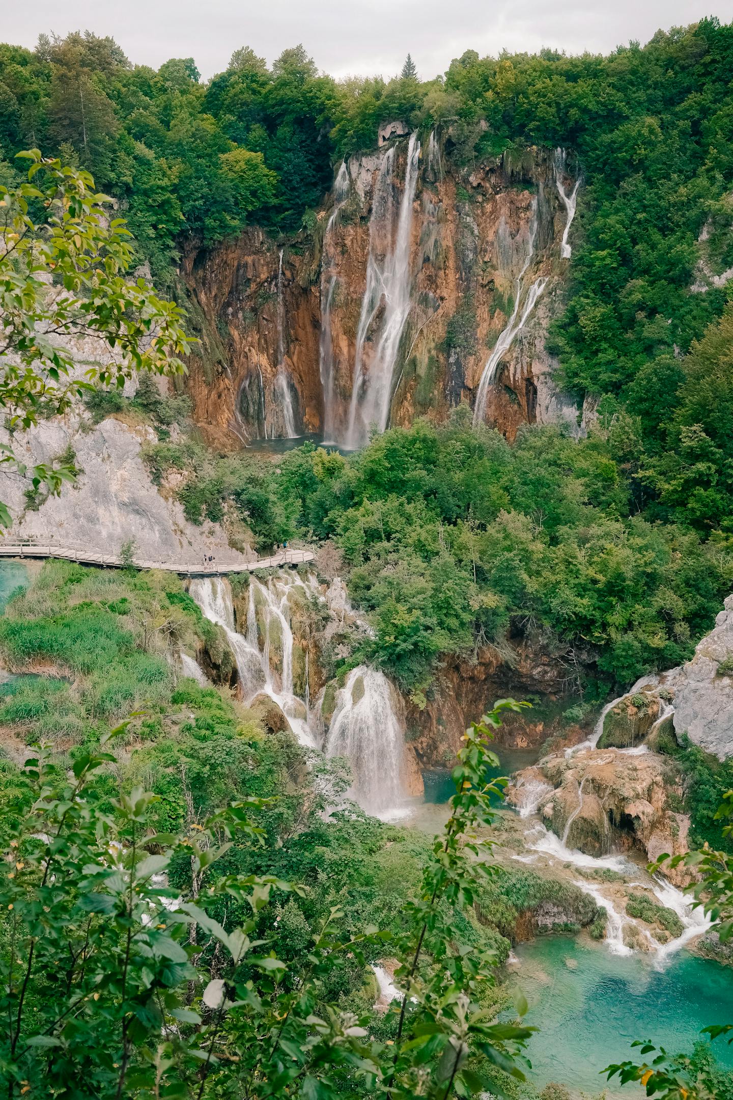 Stunning view of Plitvice Lakes National Park waterfalls featuring turquoise waters