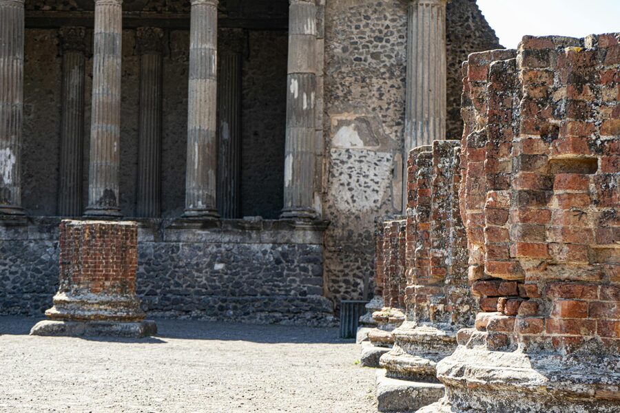 Sunlit ancient columns Pompeii ruins