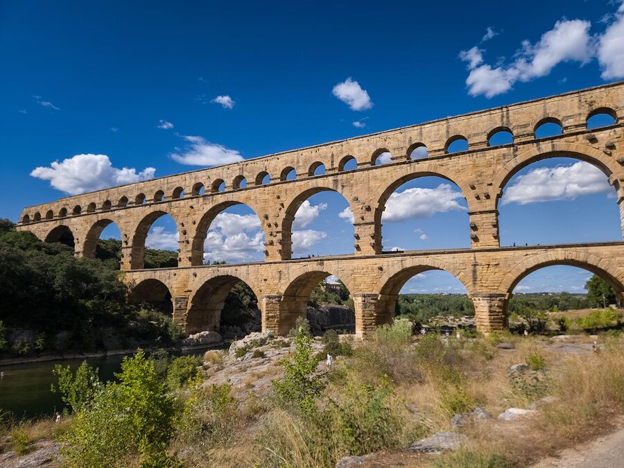 Pont du Gard aqueduct against clear blue sky near Nimes