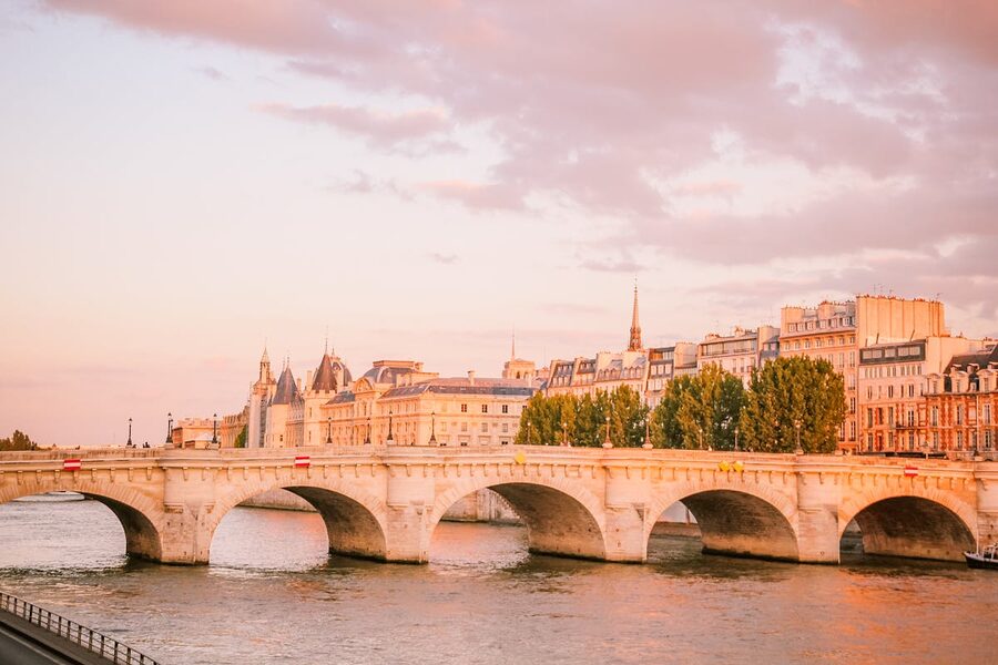 Pont Neuf bridge over Seine River at sunset in Paris