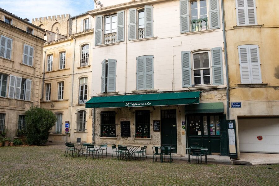 A quiet cafe in a charming stone courtyard in Avignon France
