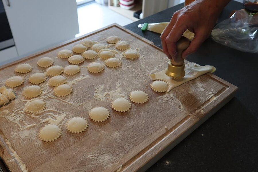 Making homemade ravioli with a pasta cutter