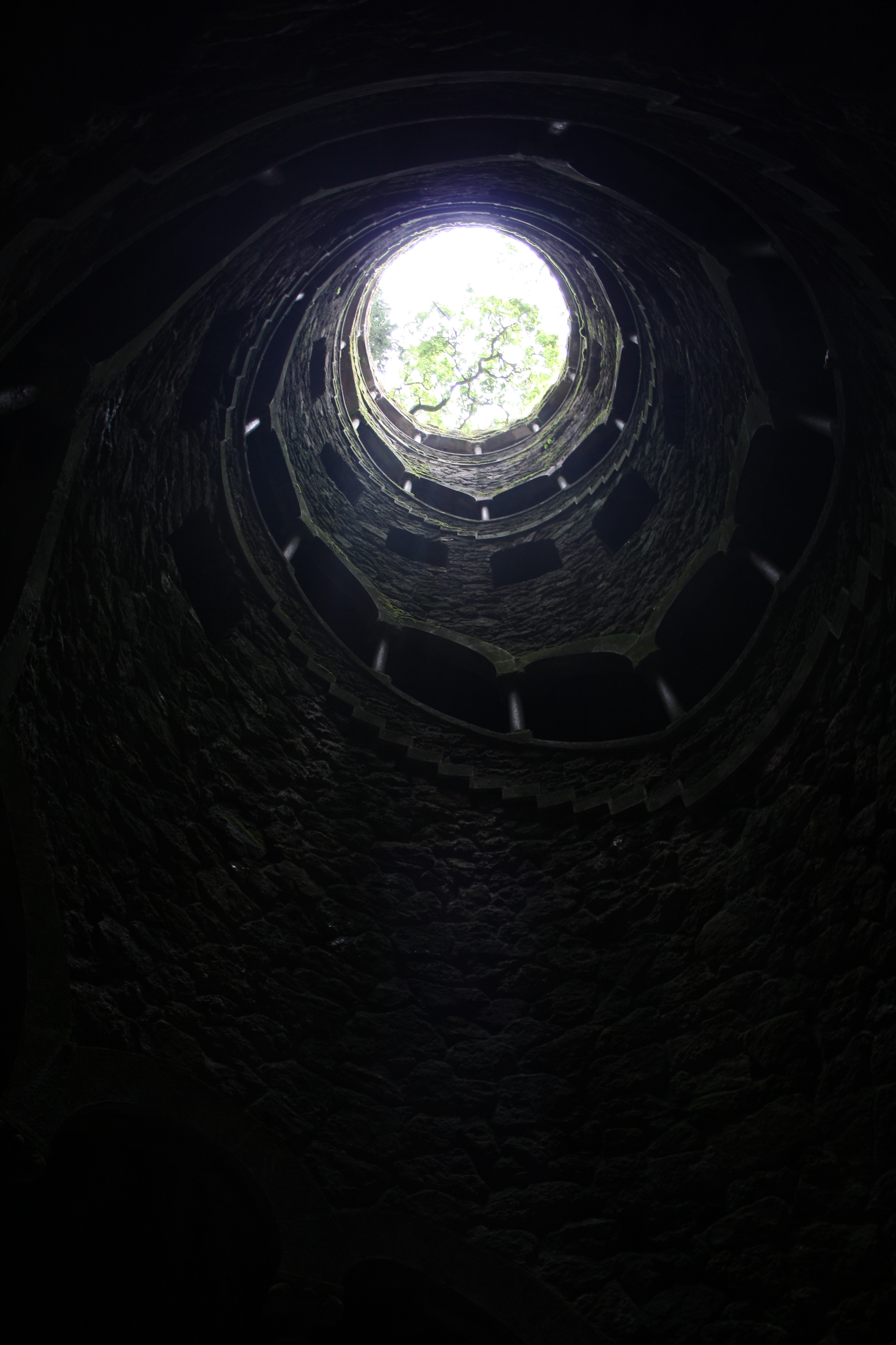 Looking down into the spiral levels of the Initiation Well at Quinta da Regaleira