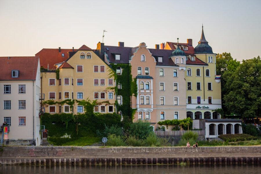Colorful riverside buildings in Regensburg