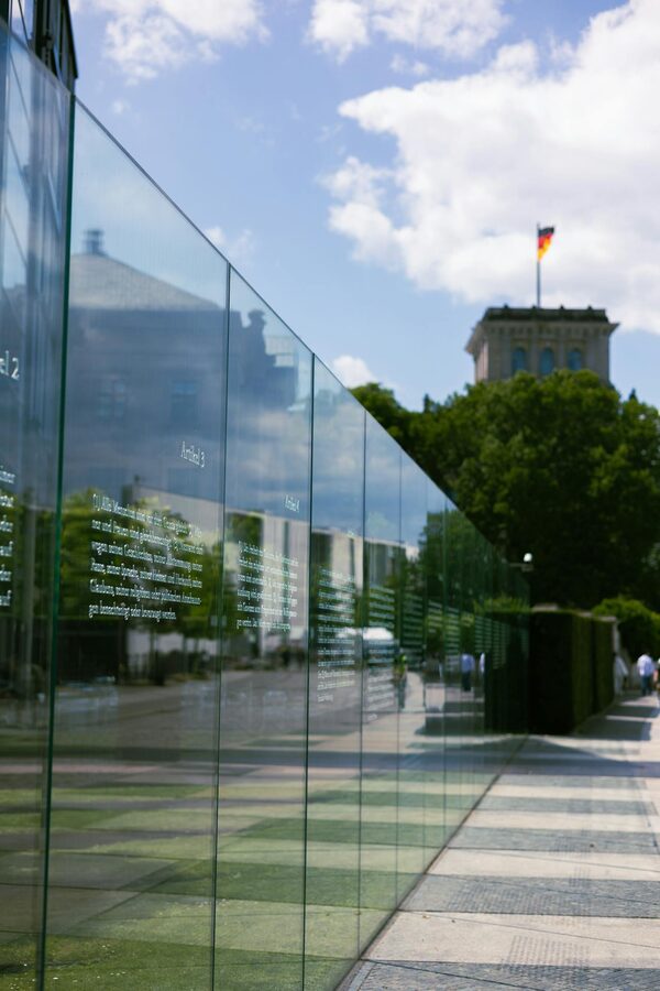 Reichstag reflective glass wall with German flag