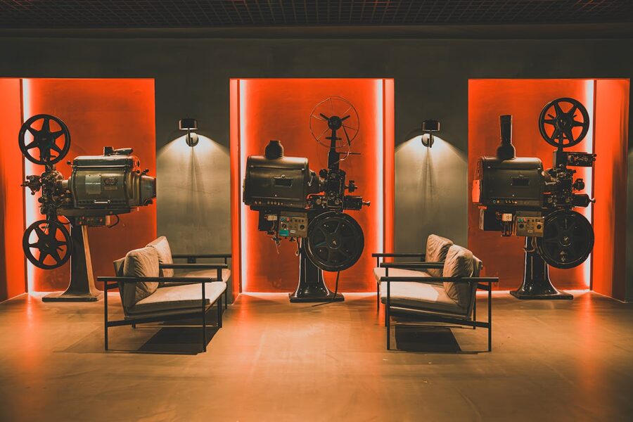 Retro cinema room with vintage film projectors and comfortable seating