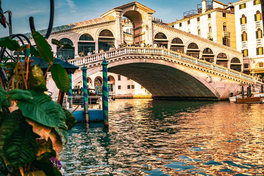 Rialto Bridge at sunset over Venice canal