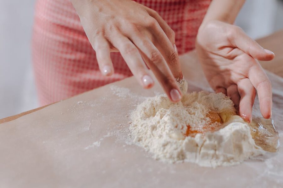 Rome cooking class kneading flour and dough