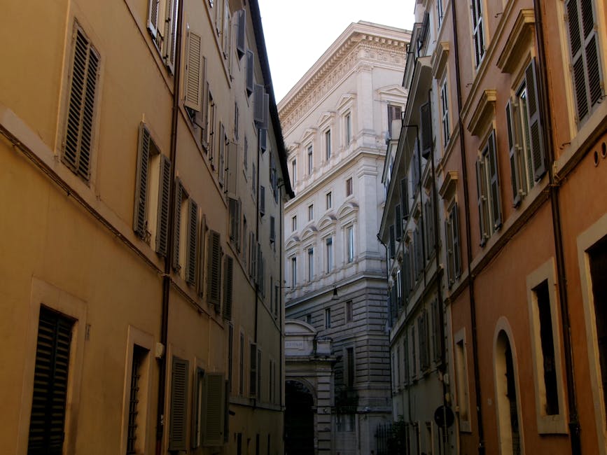 Narrow alley with historic buildings in Rome
