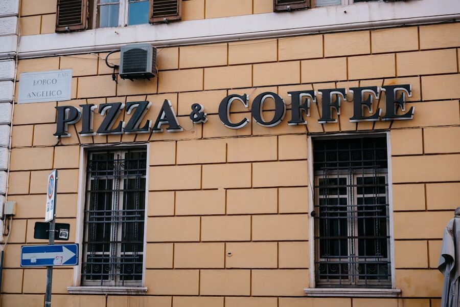 Pizzeria and coffee shop exterior in Rome