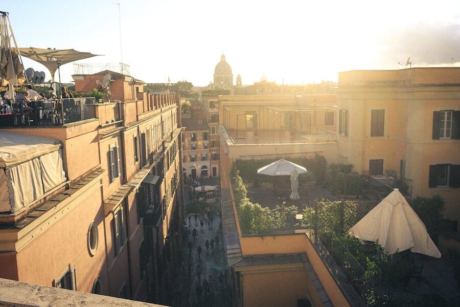Rome rooftops at sunset with historic terraces