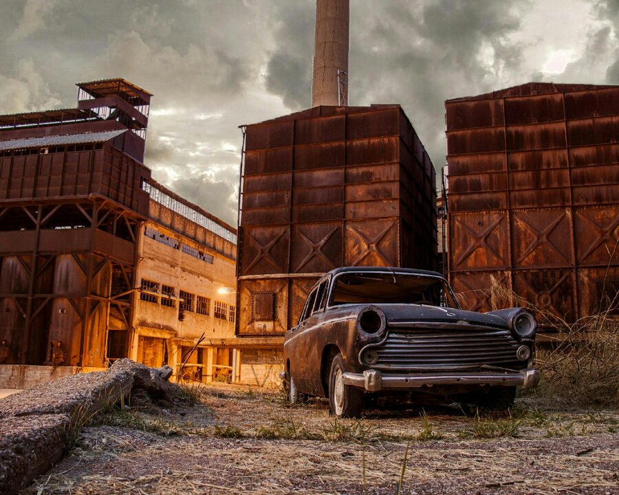 Rusty abandoned cars showing decay