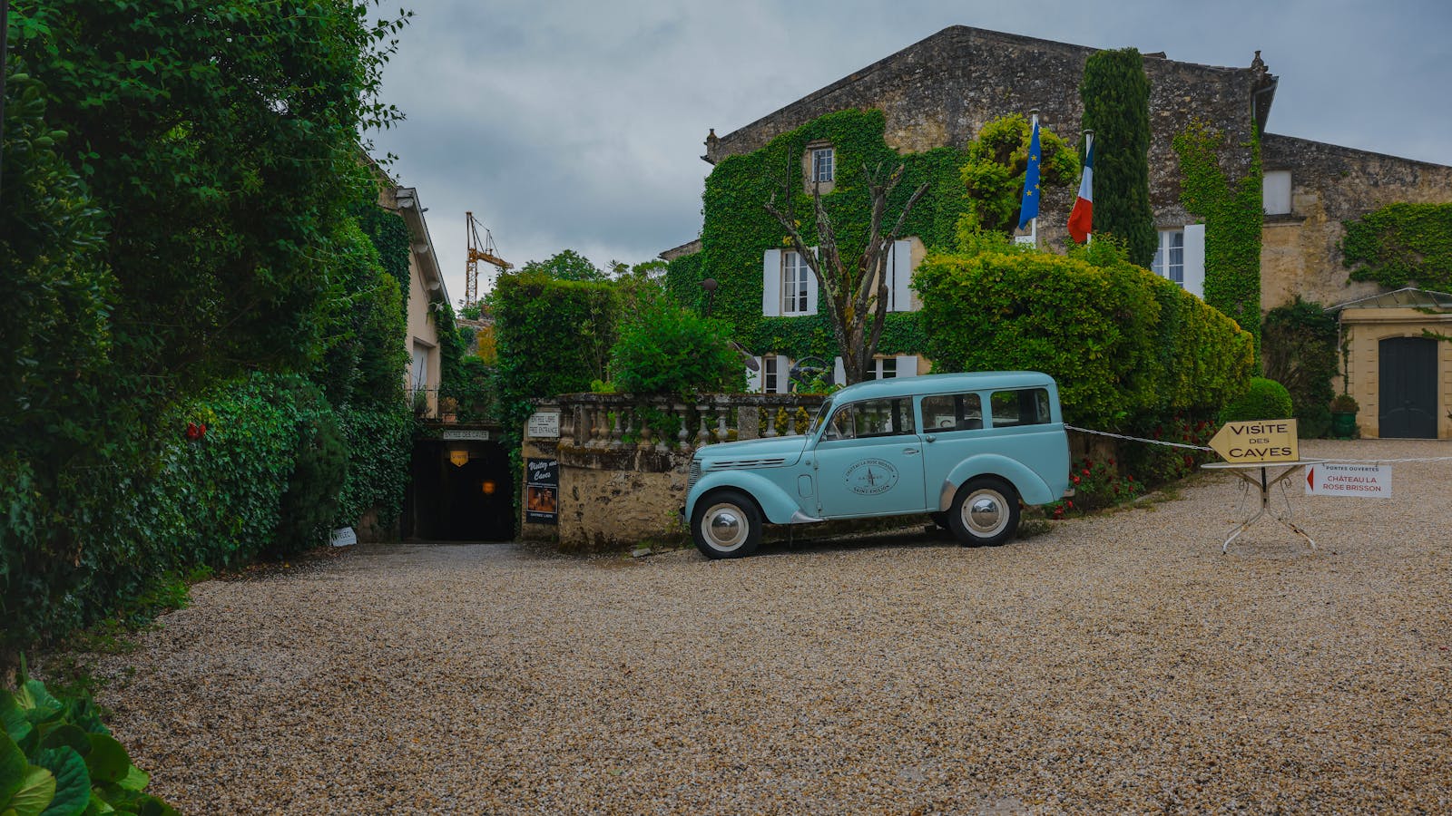 Vintage car parked at a chateau in Saint-Emilion France