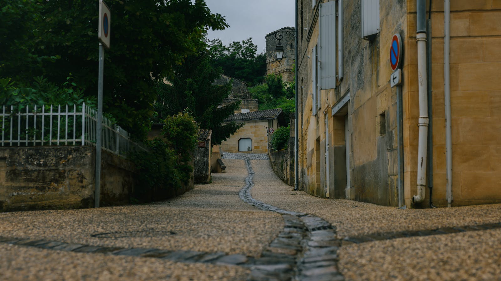Traditional stone street in Saint-Emilion France with historic architecture