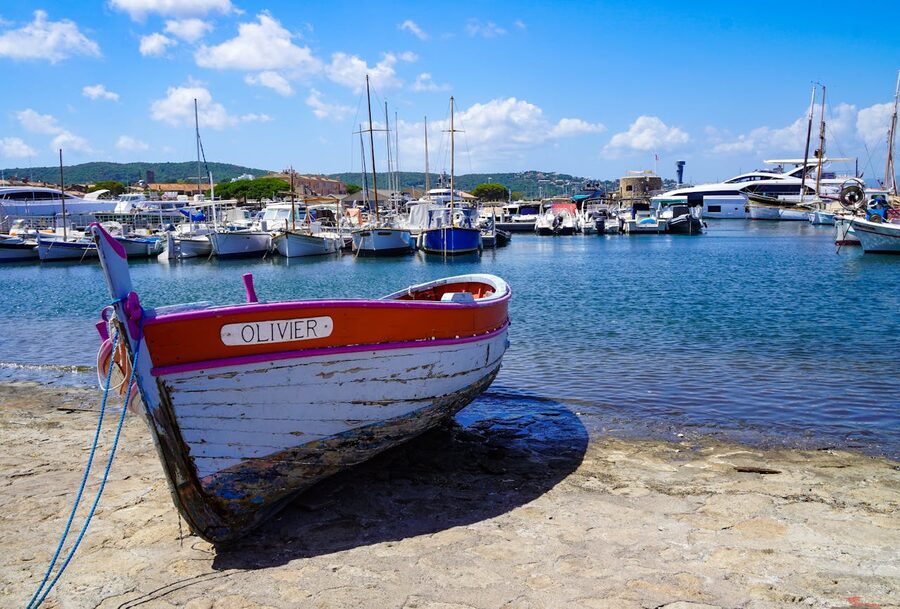Traditional wooden boats docked in the charming harbor of Saint-Tropez