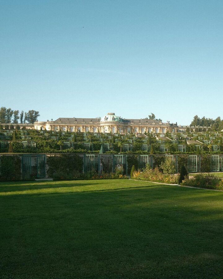 Sanssouci Palace and gardens under blue sky
