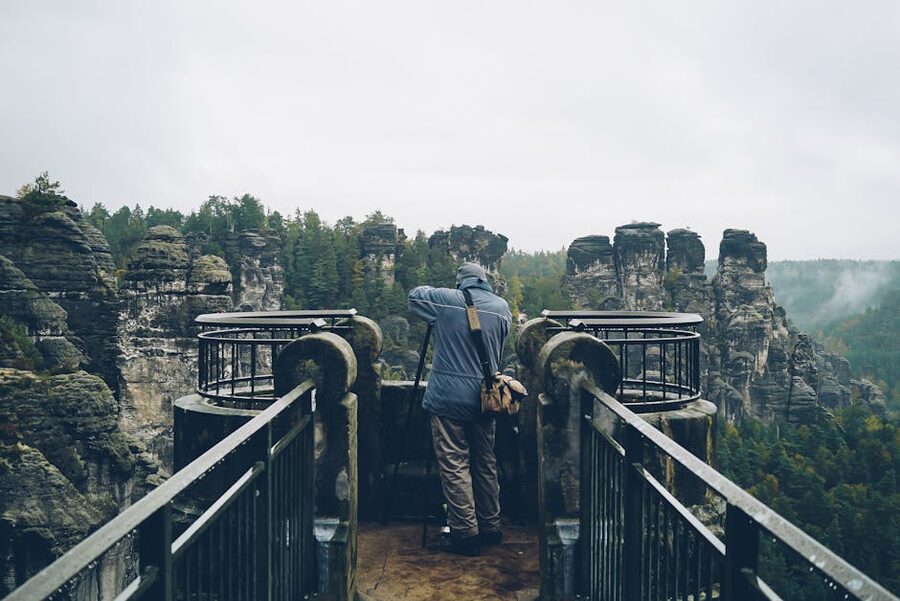Photographer capturing breathtaking cliffs in Saxon Switzerland