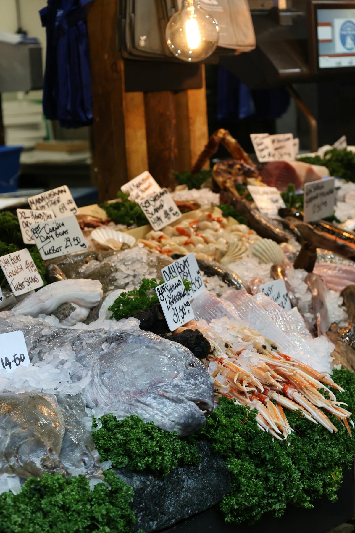 Fresh seafood displayed on ice at a market