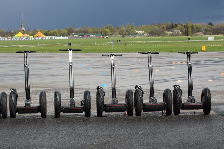 Line of Segways parked on pavement