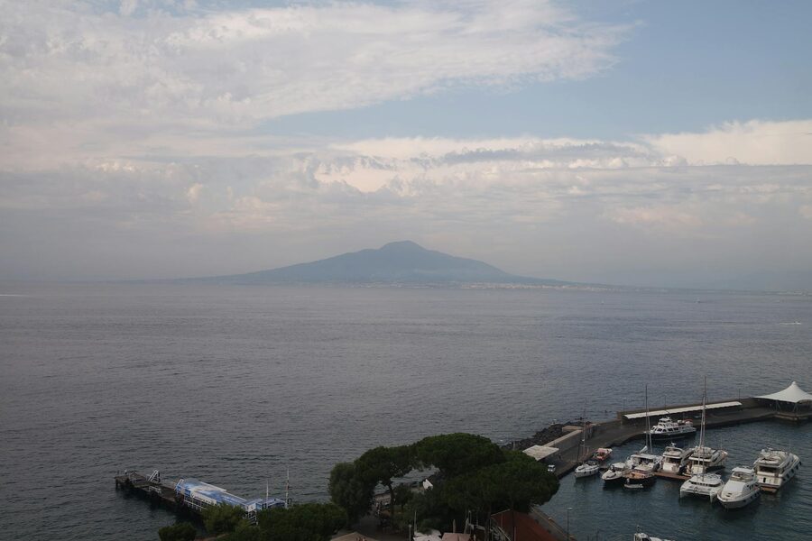Sorrento harbor with Vesuvius in distance