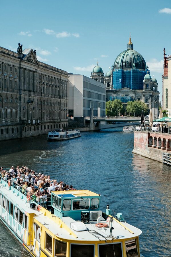 Tourist boat on the Spree River near Berlin Cathedral