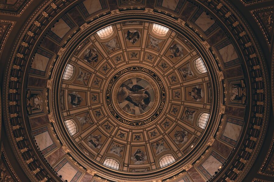 Ornate ceiling fresco and architectural details inside St Stephens Basilica Budapest