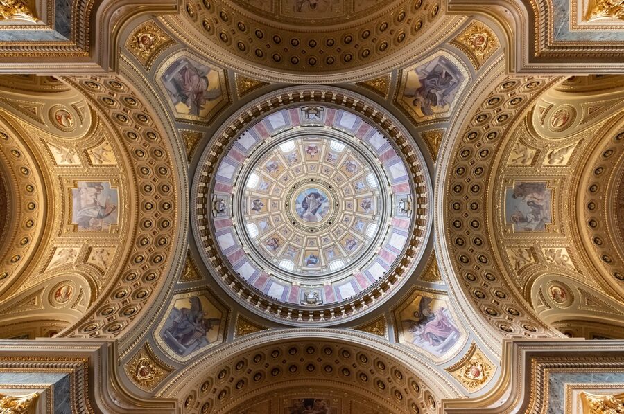 Looking up at the painted dome mosaic by Karoly Lotz inside St Stephens Basilica Budapest
