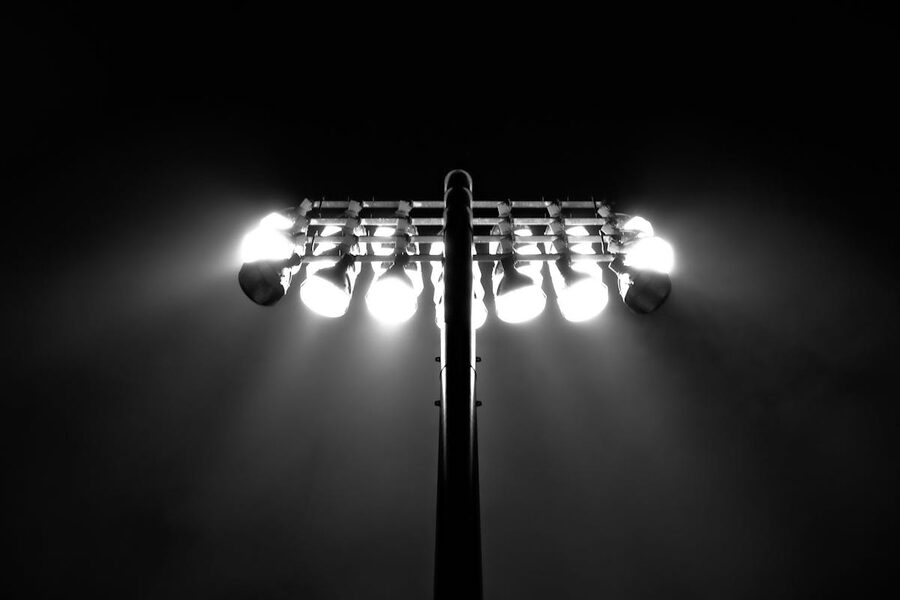 Stadium floodlights at night