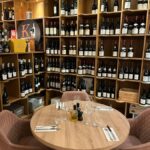 Intimate table setting in a French wine cellar for tasting