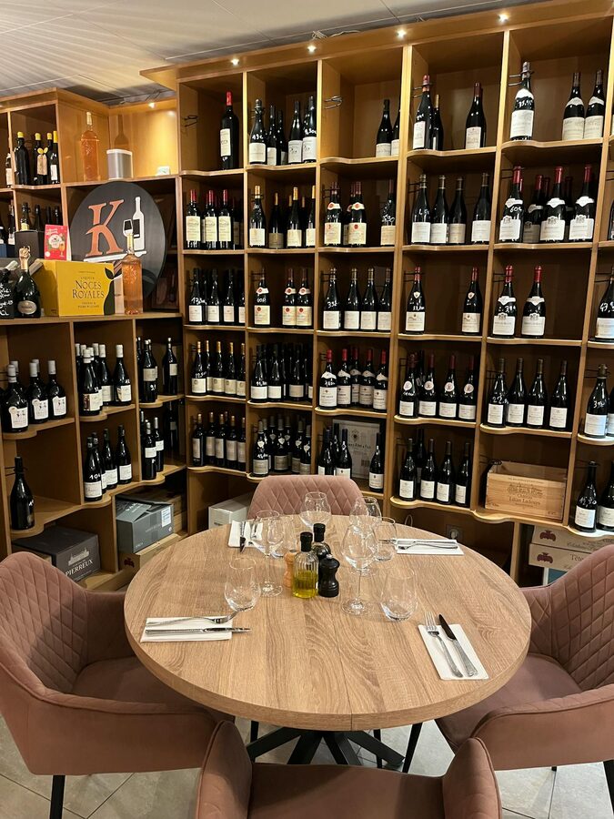 Intimate table setting in a French wine cellar for tasting