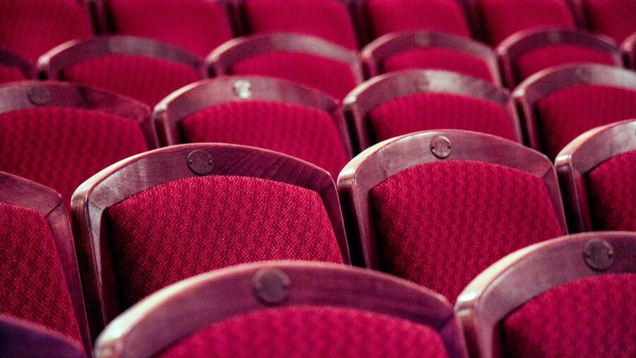 Red theatre seats at entertainment venue