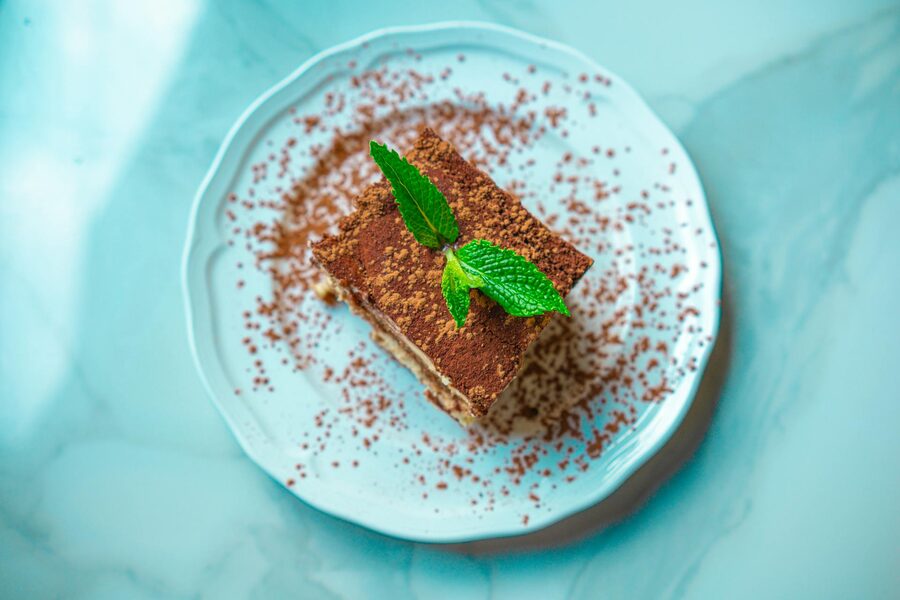 Tiramisu slice on marble plate