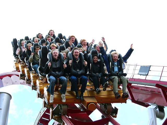 Riders on The Demon looping roller coaster at Tivoli Gardens Copenhagen