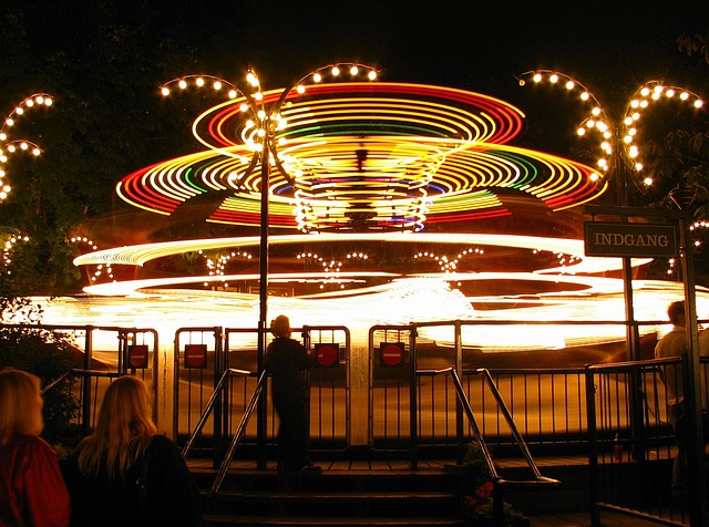 Illuminated ride at Tivoli Gardens at night in Copenhagen