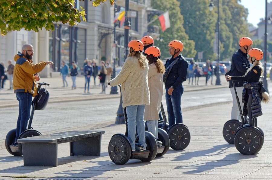Tourists on electric Segway transport