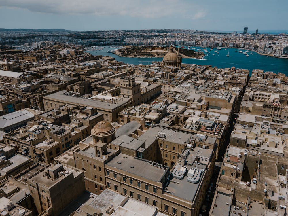 Aerial view of Valletta's historic fortified city surrounded by Mediterranean waters