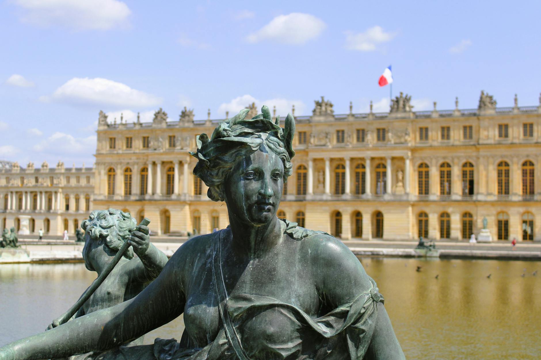 Garden statues at Versailles on a sunny day