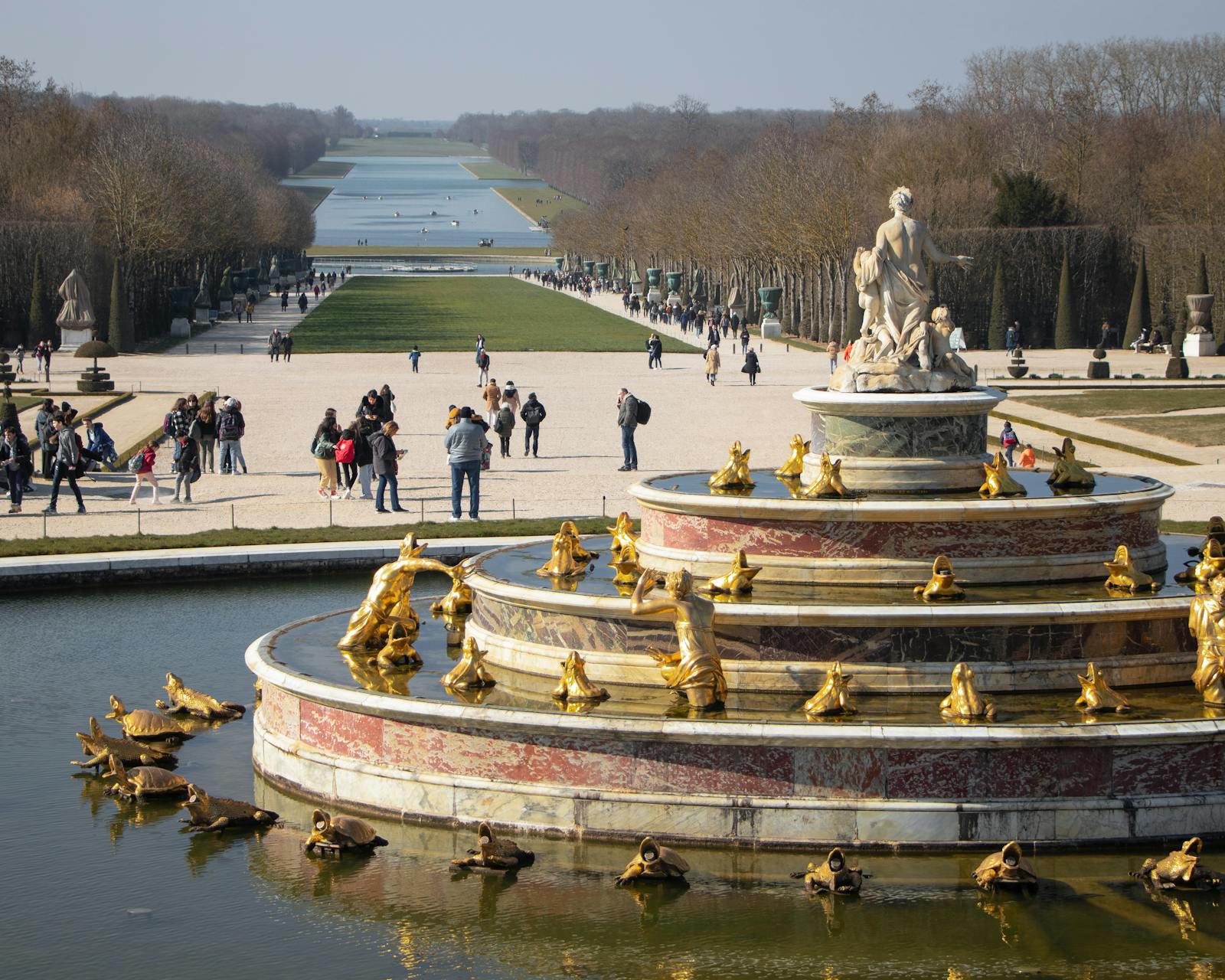 Stunning gilded fountain in the gardens of Versailles France