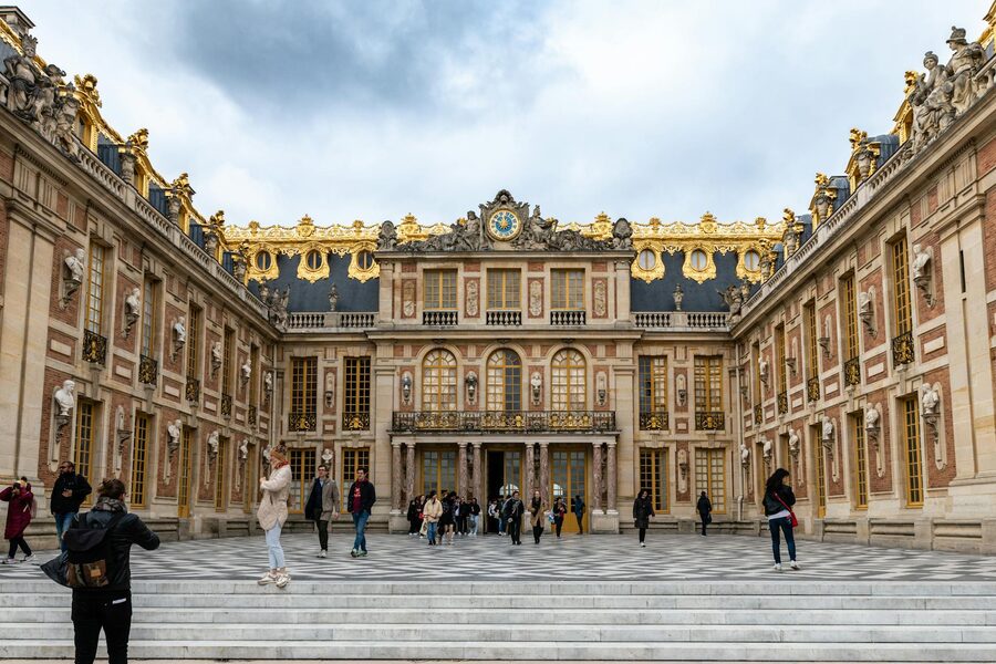The Palace of Versailles showing its baroque facade