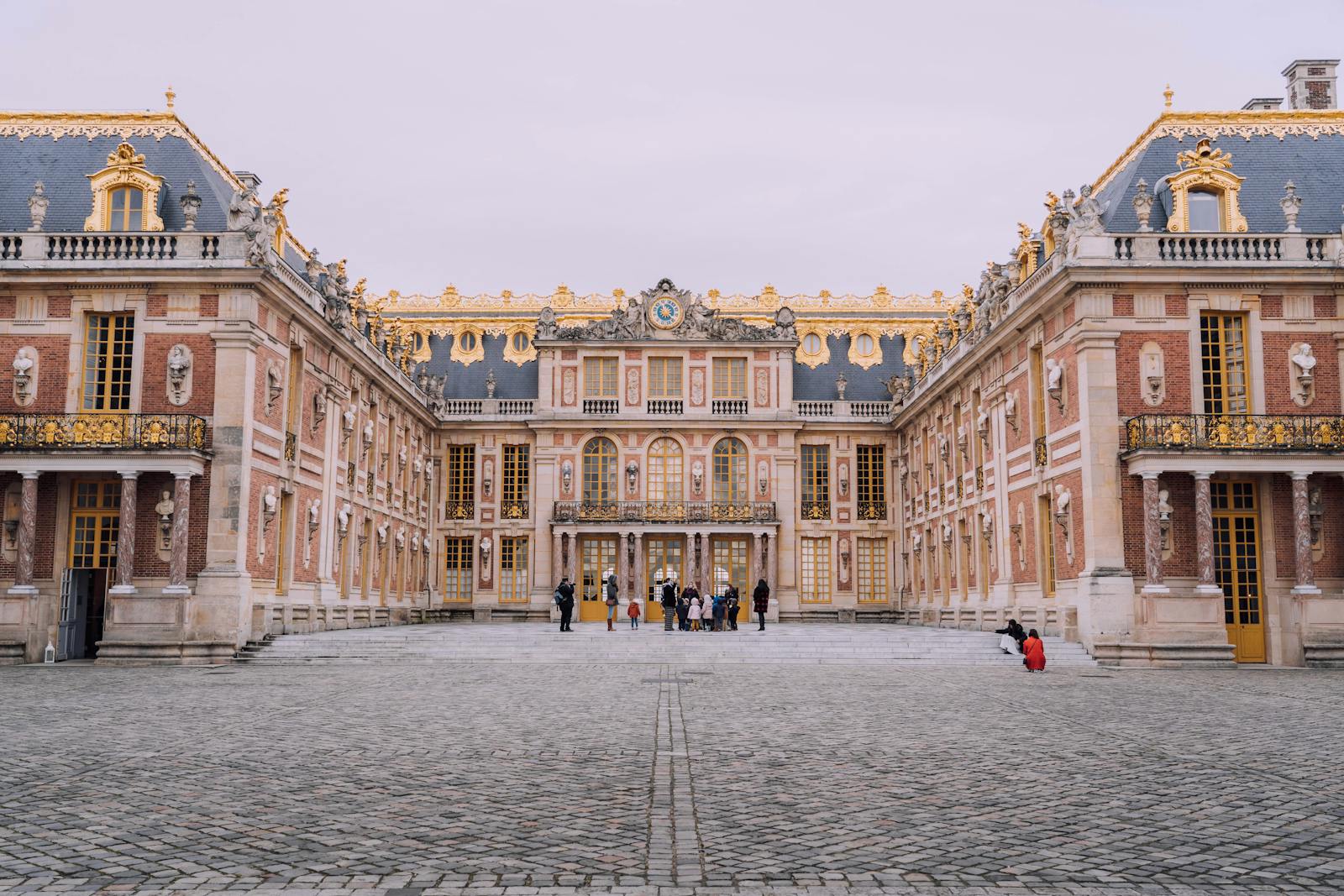 Grand courtyard of the Palace of Versailles showing classic architecture