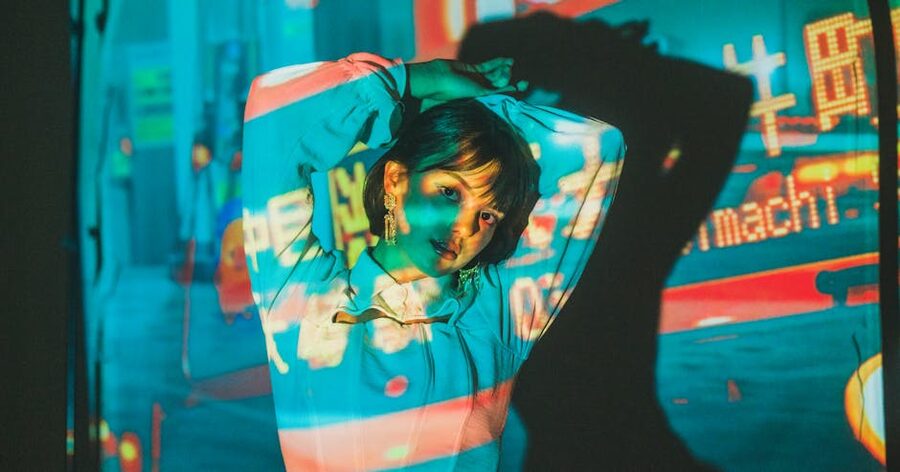 Neon light projection on person