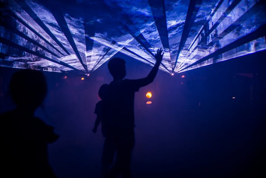 Silhouette figure in light display immersive